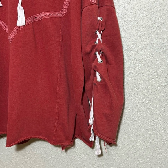POL raw hem semi cropped hoodie with tie up sleeves in rustic red. Women’s M - Picture 3 of 7
